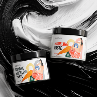Two jars of modeling paste with a artistic black and white swirl background